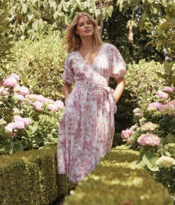 The Coastal Poplin Puff-Sleeve Wrap Midi Dress - Batik Floral In Faded Rose & White Sand -Summersalt Shop 2 ModelBack a7326308 93aa 4528 9ec1 4f247a1deb7a