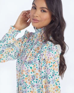 The Silky Mock Neck Blouse - Wildflower Fields In Sunshine & Coral -Summersalt Shop 7 ExtraProductShot3 bf8067a6 746b 4c6d 848a 6927edb56c8d