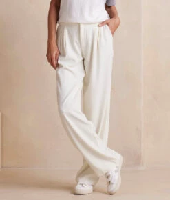 The Classic Pleat Straight Leg Trouser Pant - White Sand 9 The Classic Pleat Straight Leg Trouser Pant - White Sand -Summersalt Shop ClassicPleatStraightLegTrouserPant WhiteSand Front Crop